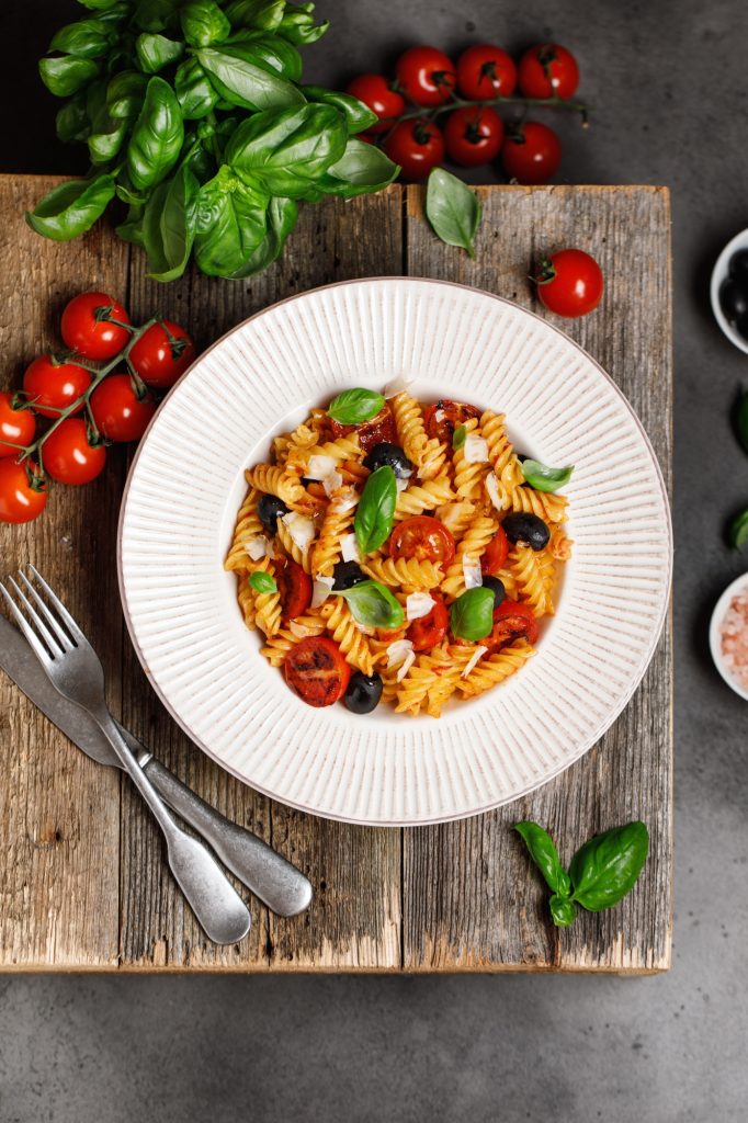 Bella Italia organic kamut fusilli pasta with tomatoes, parmesan cheese, olives and basil